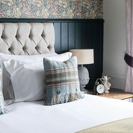 The Fleece At סירנססטר מראה חיצוני תמונה A bedroom at The Old Bank Hotel