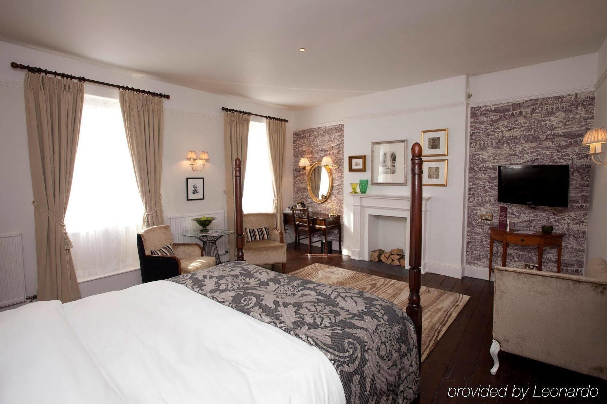 The Fleece At סירנססטר חדר תמונה A room at the hotel