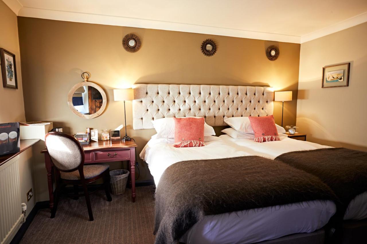 The Fleece At סירנססטר מראה חיצוני תמונה A room at the hotel