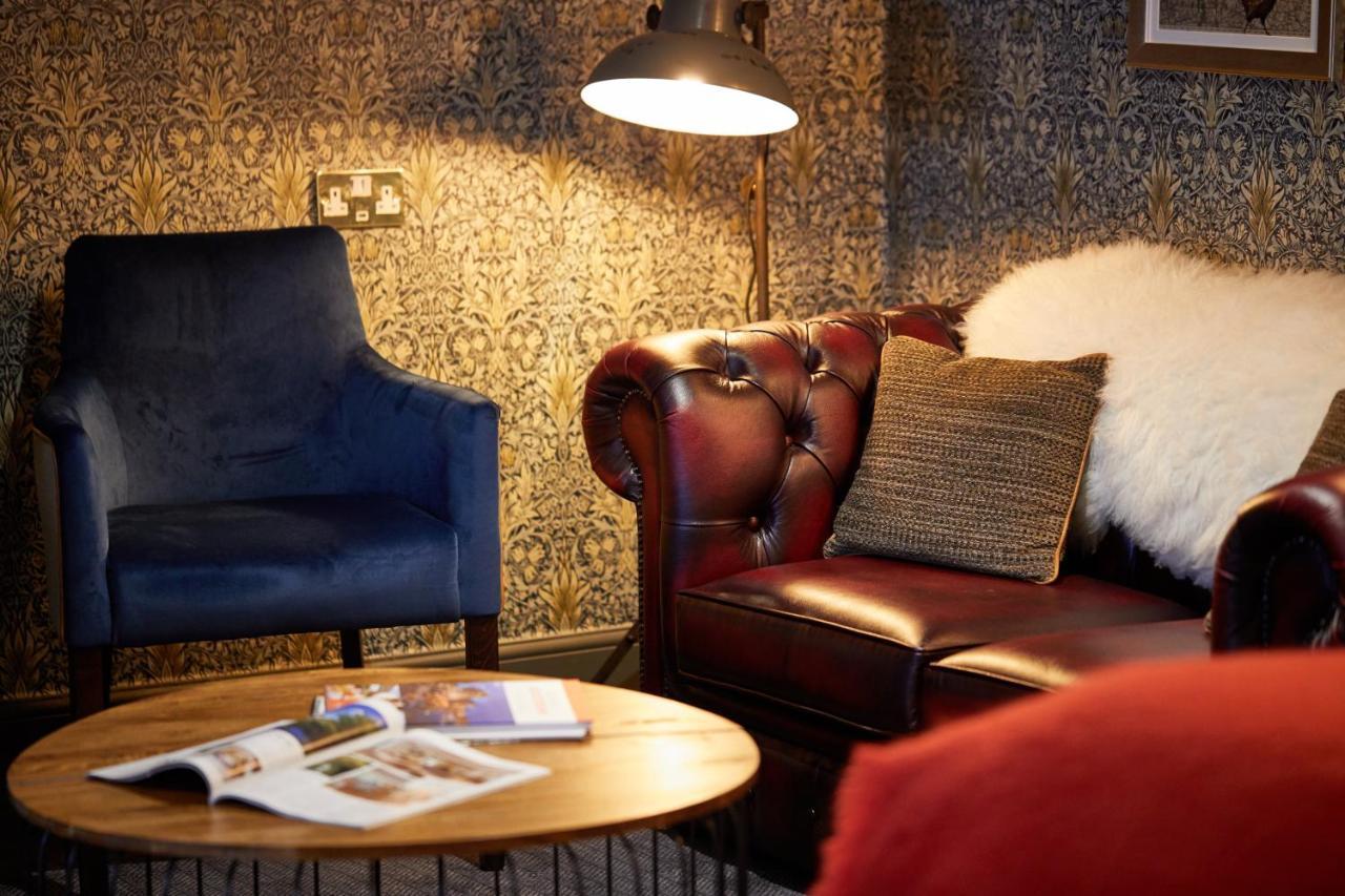 The Fleece At סירנססטר מראה חיצוני תמונה The interior of the lounge