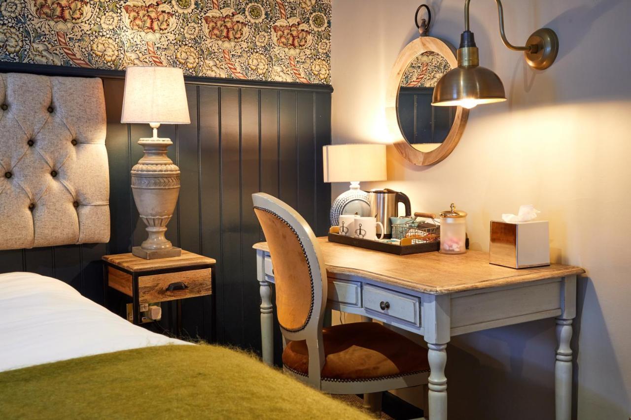 The Fleece At סירנססטר מראה חיצוני תמונה A room at the hotel
