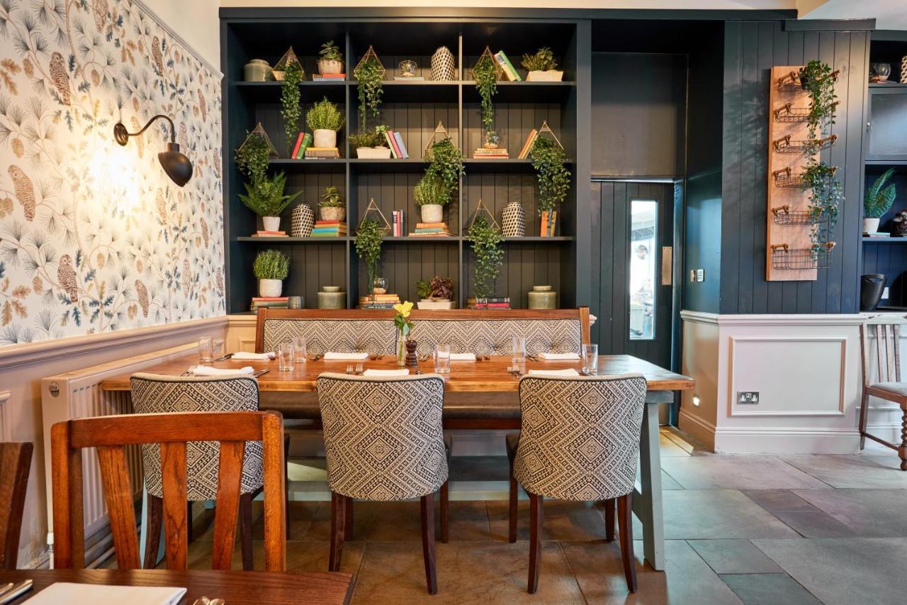 The Fleece At סירנססטר מראה חיצוני תמונה The interior of the restaurant