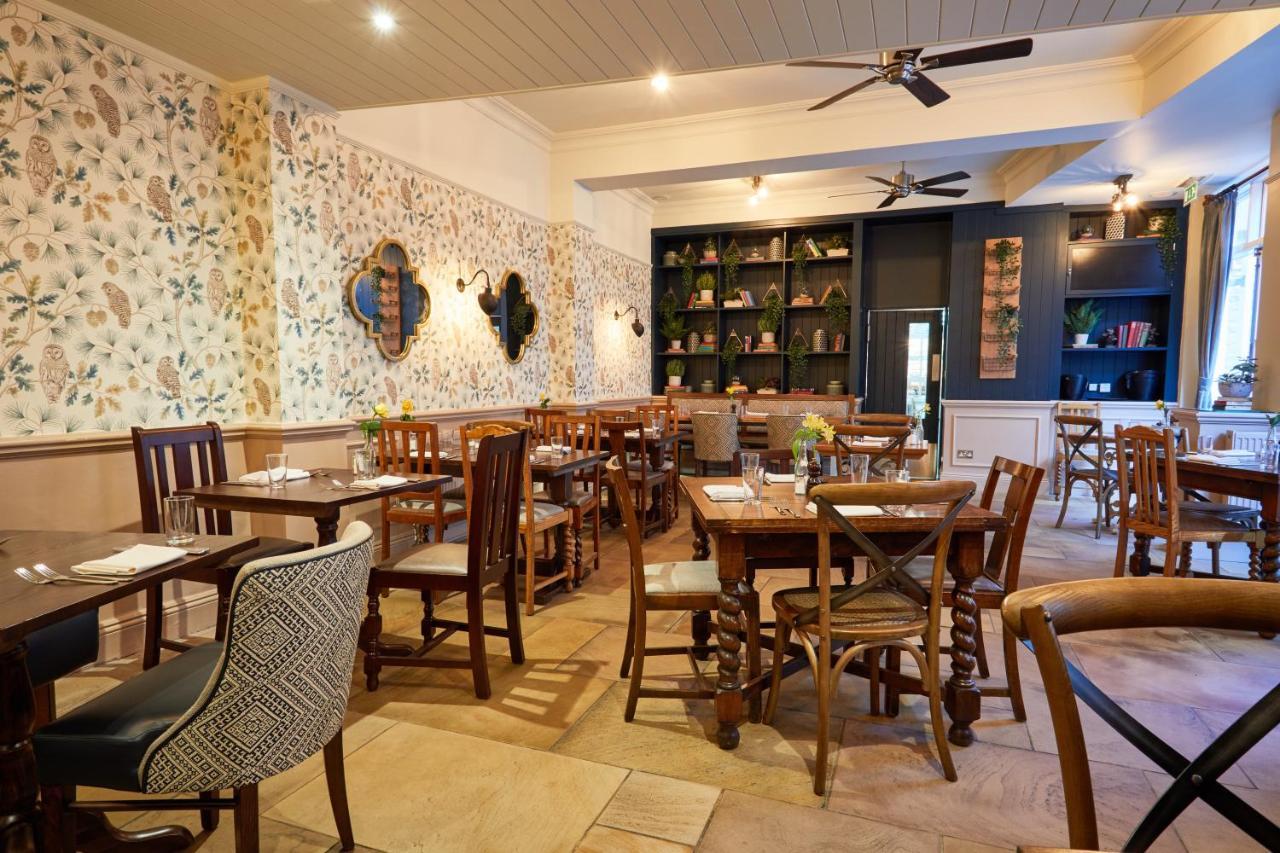 The Fleece At סירנססטר מראה חיצוני תמונה The interior of the restaurant